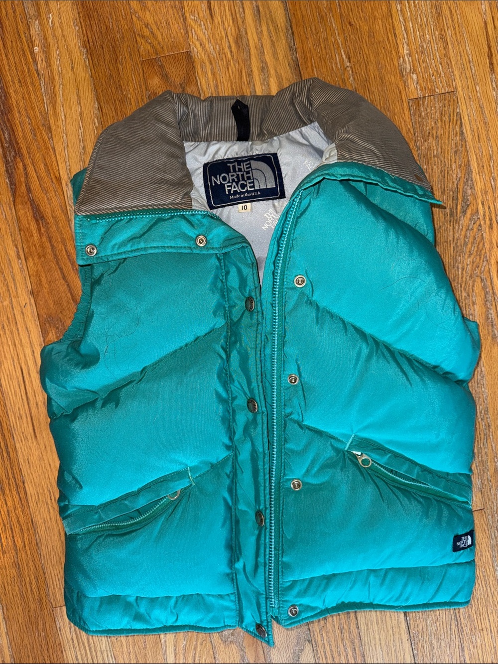 The North Face Teal Kids Puffer Vest with Contrast Collar